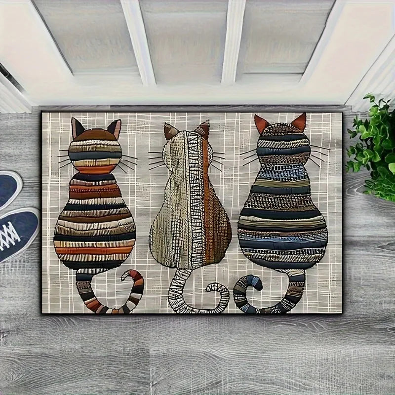 Paillasson avec trois chats de dos 
